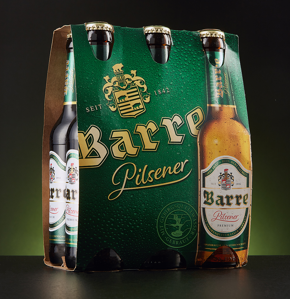 A Barre Pilsener six-pack carrier with bottles