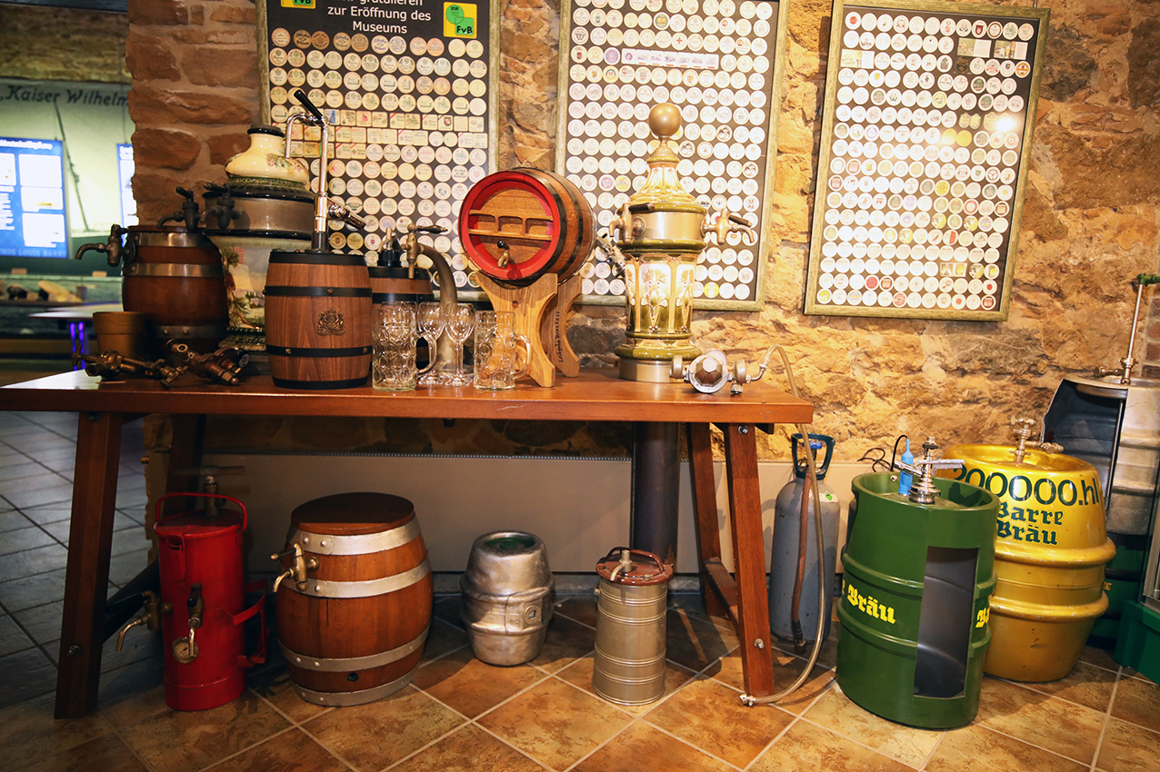 Historic taps, casks and beer mats gathered in the brewery museum