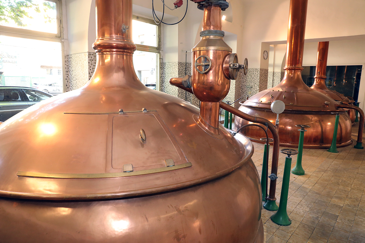 Polished copper brewing kettles in the historic Barre brewhouse